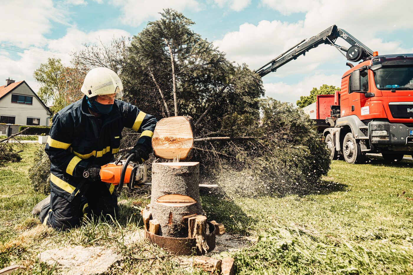 Emergency tree removal crew cutting a fallen tree in Atlanta, GA